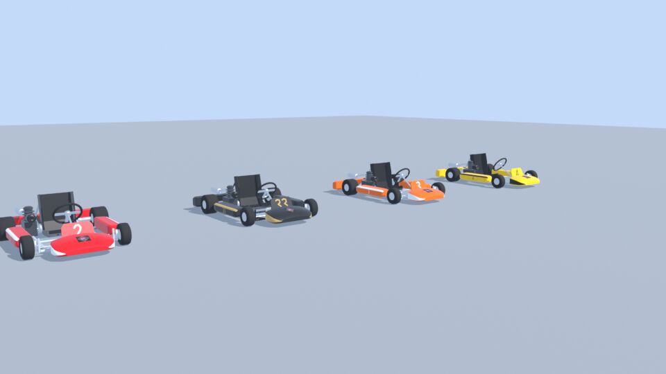 Four go-karts in different liveries
