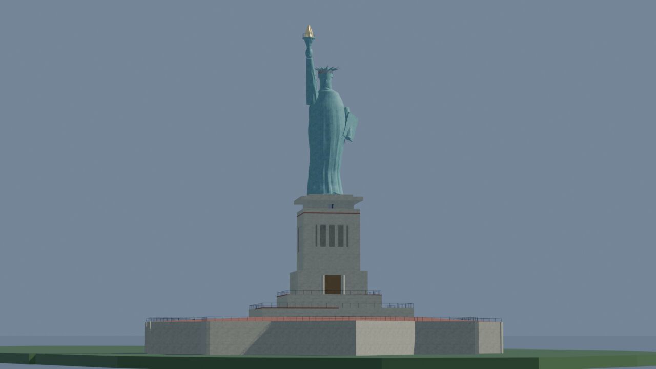 Statue of Liberty model on its pedestal over the harbour